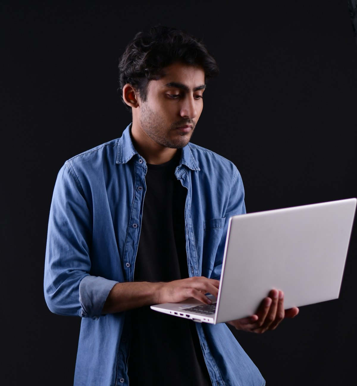Software developer working on a laptop