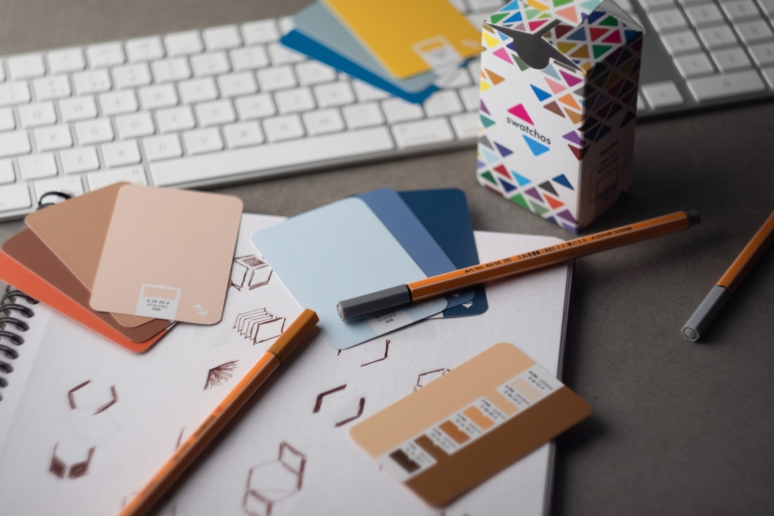 Designer's desk with color swatches and sketches
